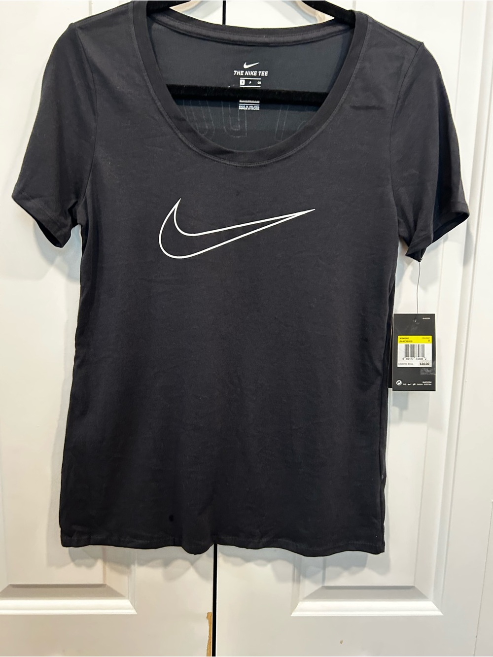 NWT  "The Nike Tee" Dri-Fit Swoosh Tee 
Women’s Small